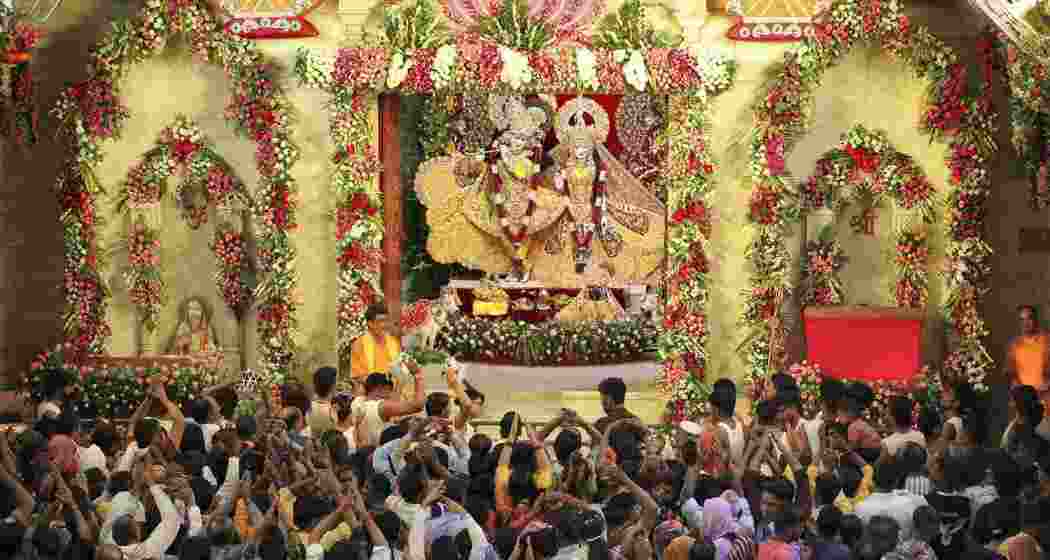 Devotees offer prayers to Lord Krishna and Goddess Radha at Bhagwat Bhawan of Sri Krishna Janmasthan Temple on the occasion of the Janamshtami festival, in Mathura, Monday, Aug. 26, 2024.