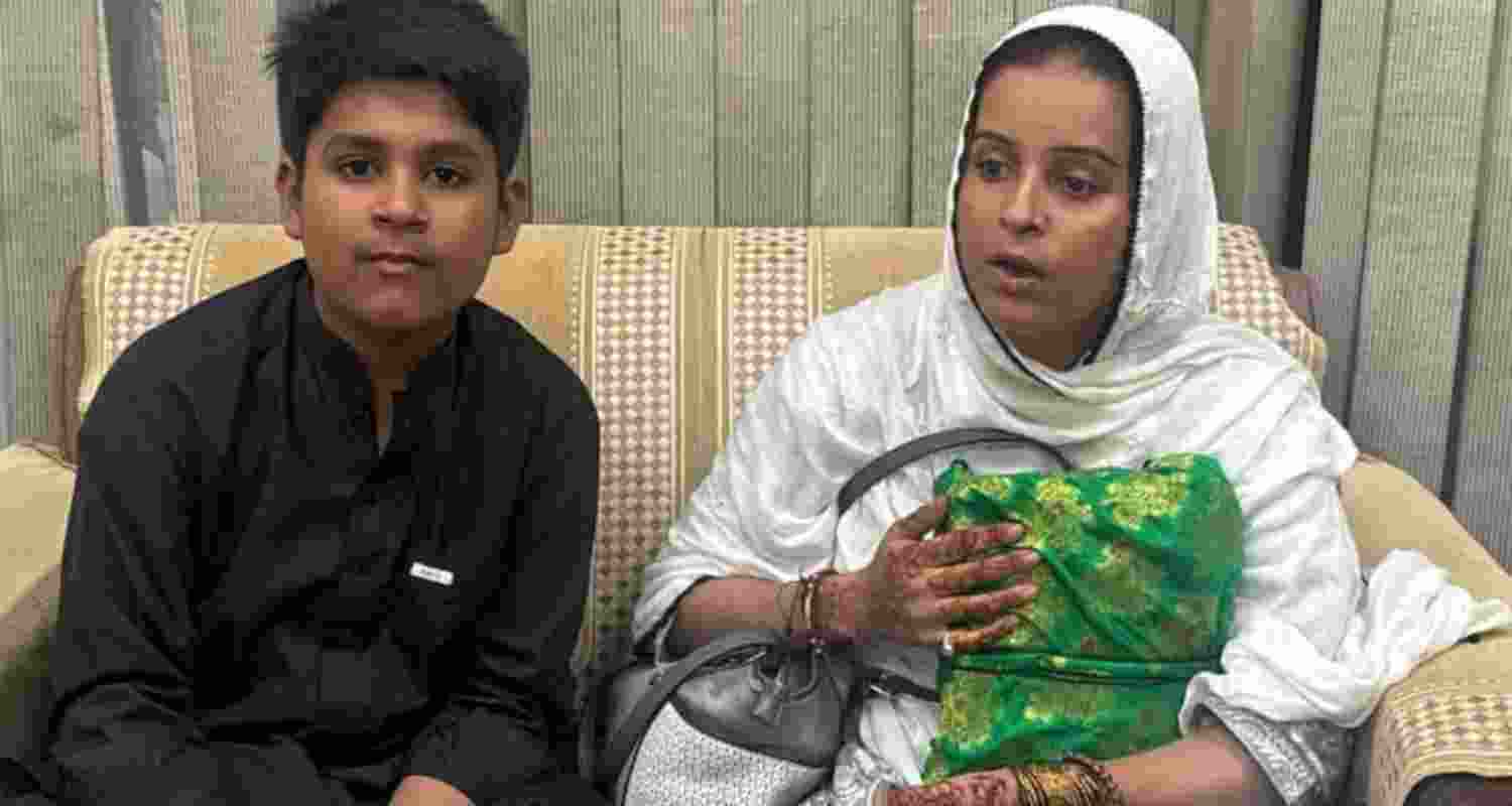 Wahida Begum along with her son Faiz following their return to India. 
