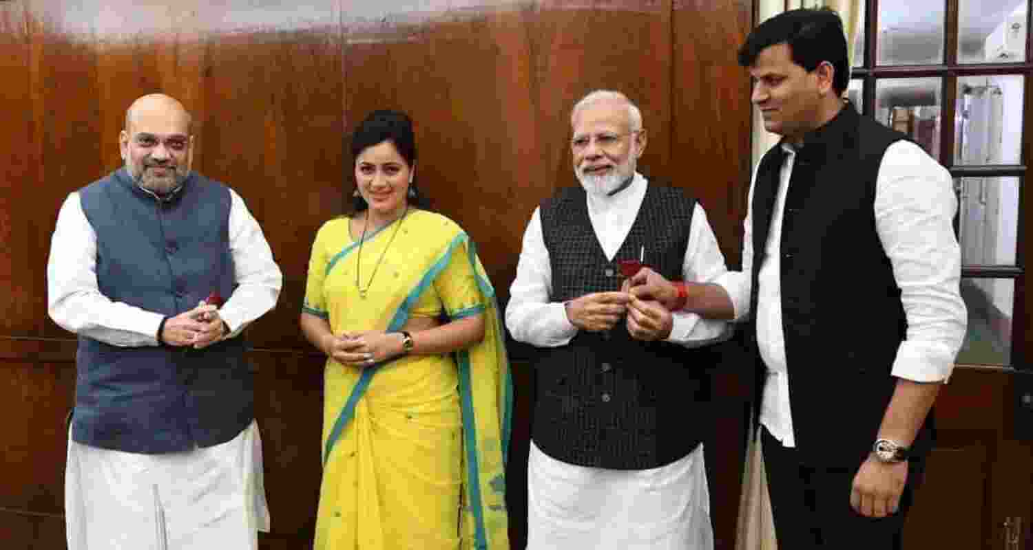 Former Amravati Independent MP Navneet Rana joins BJP with her Husband MLA from Maharashtra Ravi Rana meeting Home Minister Amit Shah and PM Narendra Modi. Image X.