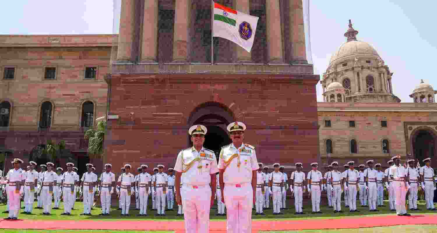Admiral Dinesh Kumar Tripathi with outgoing Navy Chief Adm R. Hari Kumar. 