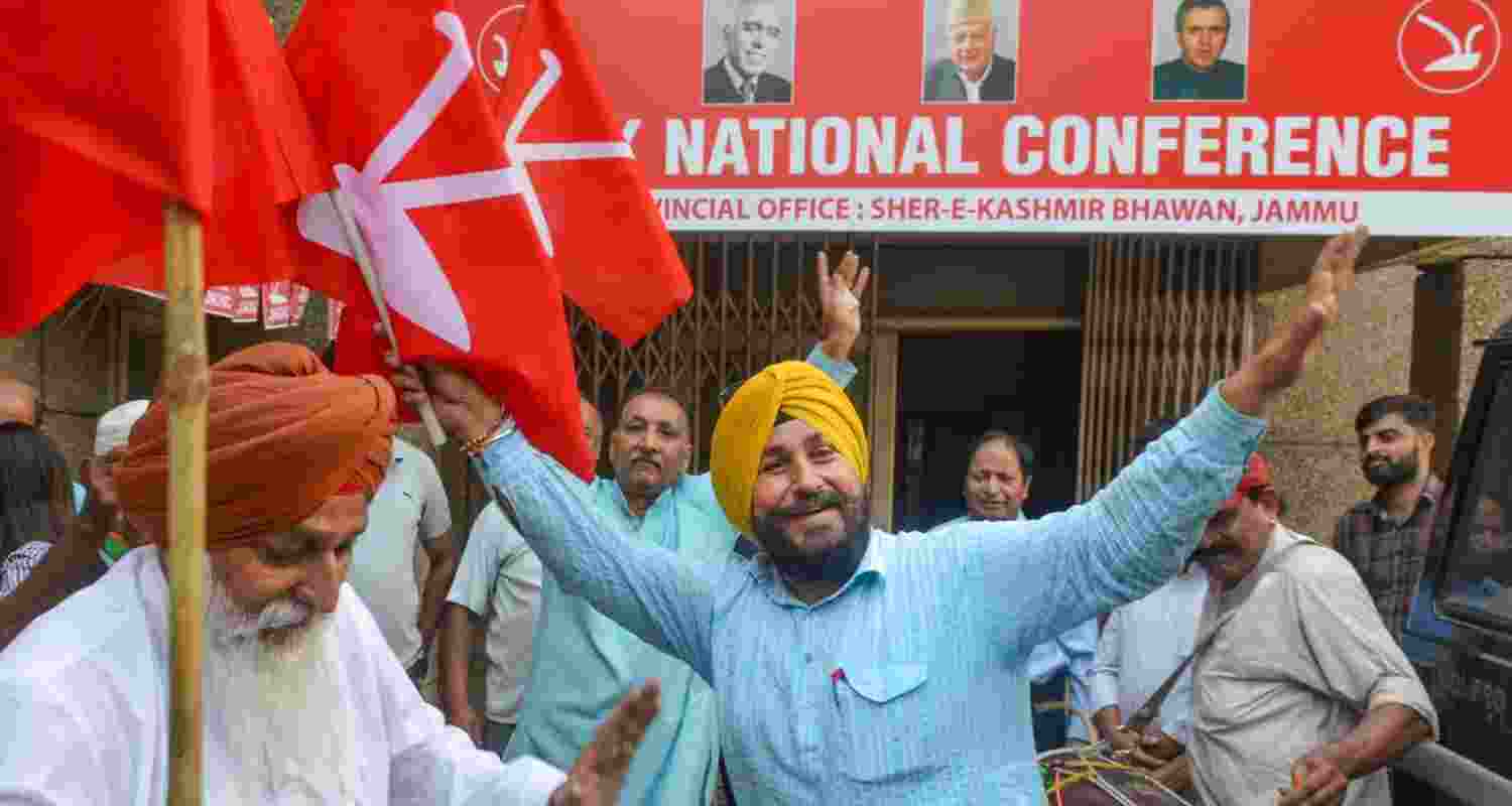 Jammu: National Conference workers celebrate at the party office after party leader Omar Abdullah took oath as Jammu and Kashmir Chief Minister, in Jammu, Wednesday.