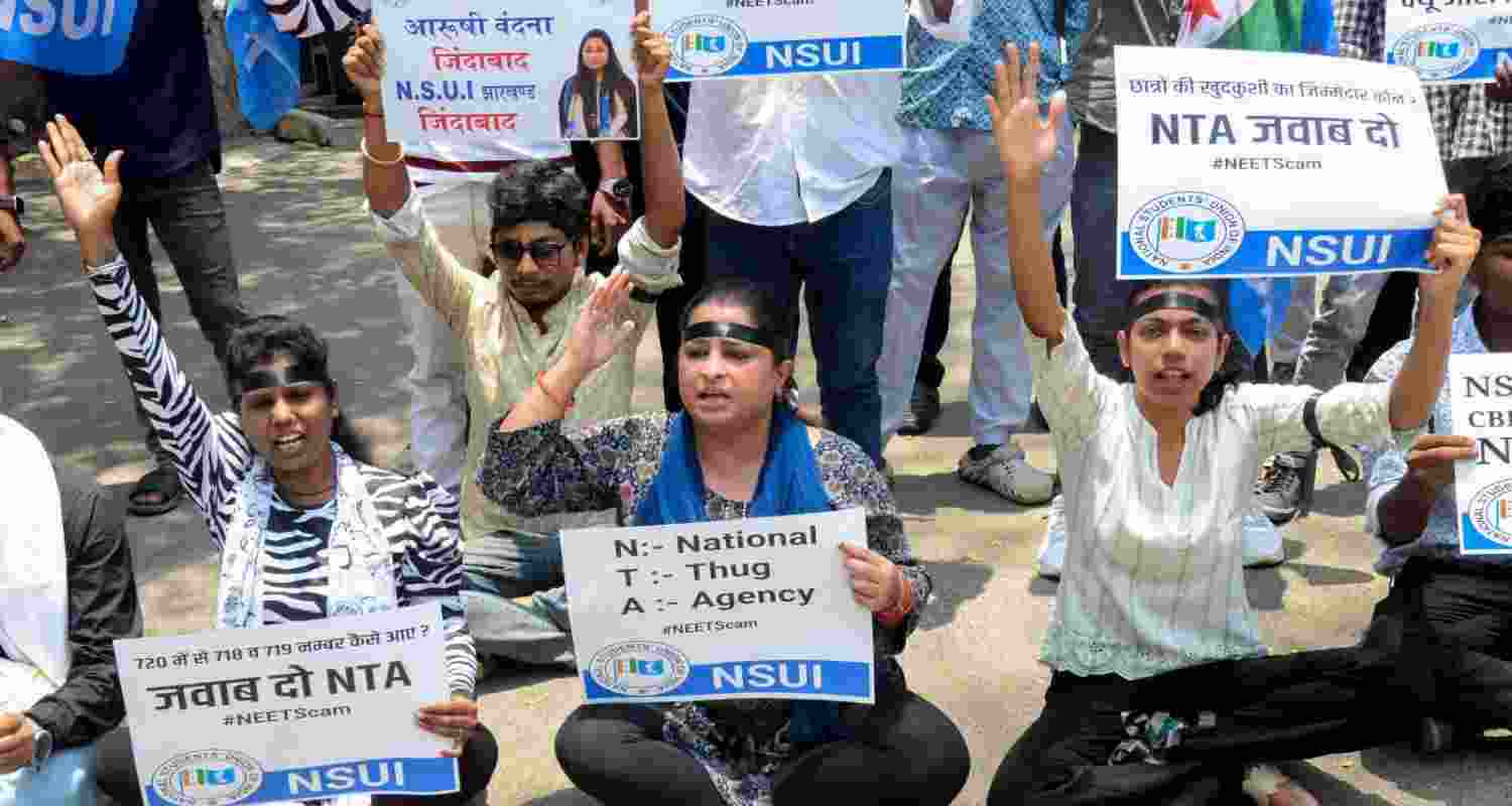NSUI protesting against the alleged discrepancies in the recently conducted NEET exam.