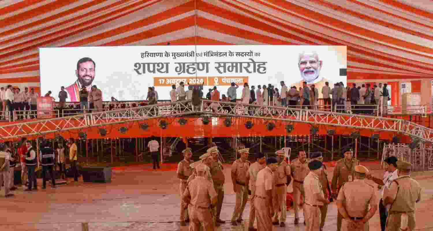 Security personnel deployed at the Dussehra ground as preparations are underway for the swearing-in ceremony of the new for the Haryana government, in Panchkula.