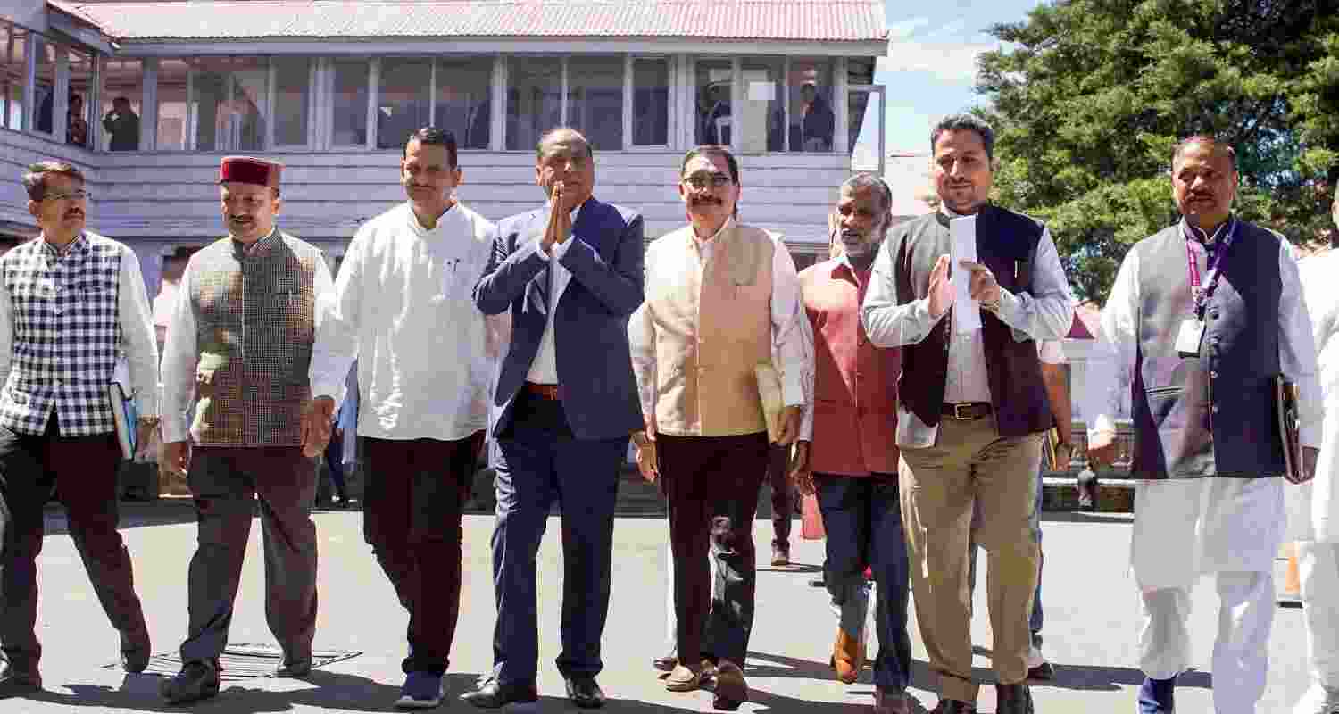 Members of the Opposition, led by Jai Ram Thakur, outside HP assembly. 