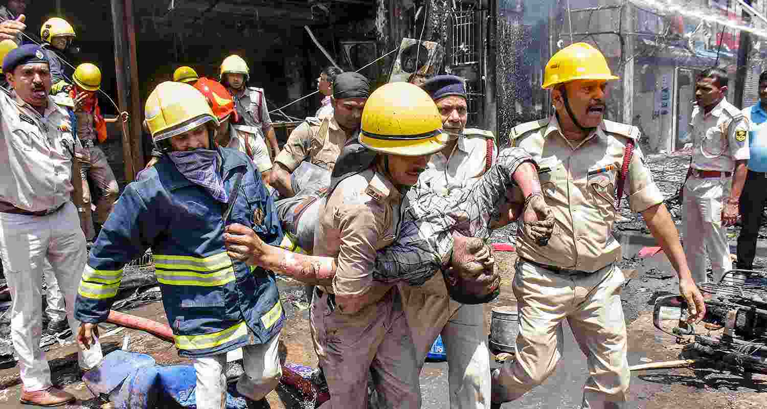 At least three persons died in a fire that broke out in a hotel close to the Patna junction railway station on Thursday, a senior official said.