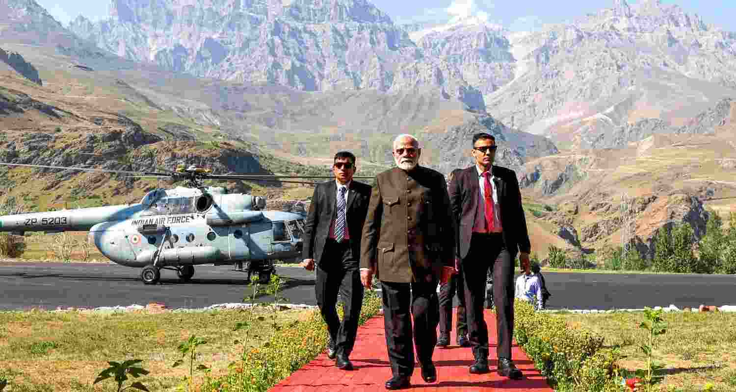Prime Minister Narendra Modi pays homage at the Kargil War Memorial on the occasion of the 25th anniversary of the Kargil Vijay Diwas, in Dras, Friday. 