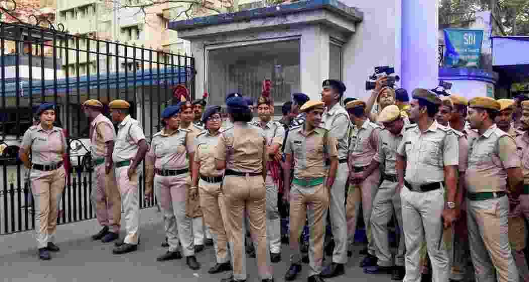 Security personnel stand guard outside Bhavani Bhawan (West Bengal Police headquarters) where CBI officials arrived to take TMC's Sheikh Shahjahan, accused in the Sandeshkhali case