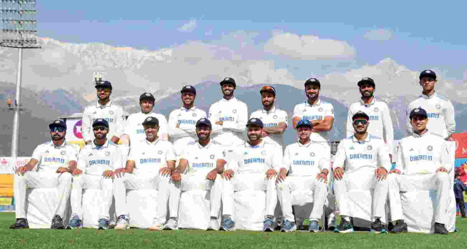 Indian men cricket team pose for a photograph after their series victory over England in Dharmshala. 