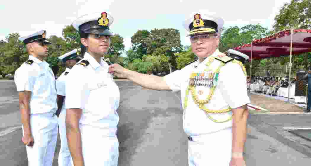 Sub-Lieutenant Anamika B Rajeev being awarded the 'Golden Wings'.