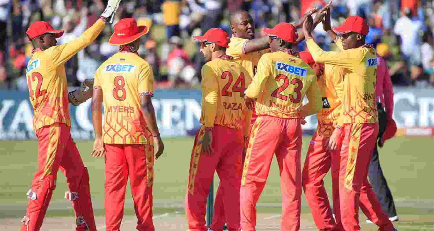 Team Zimbabwe celebrate their victory in the first T20I against India.