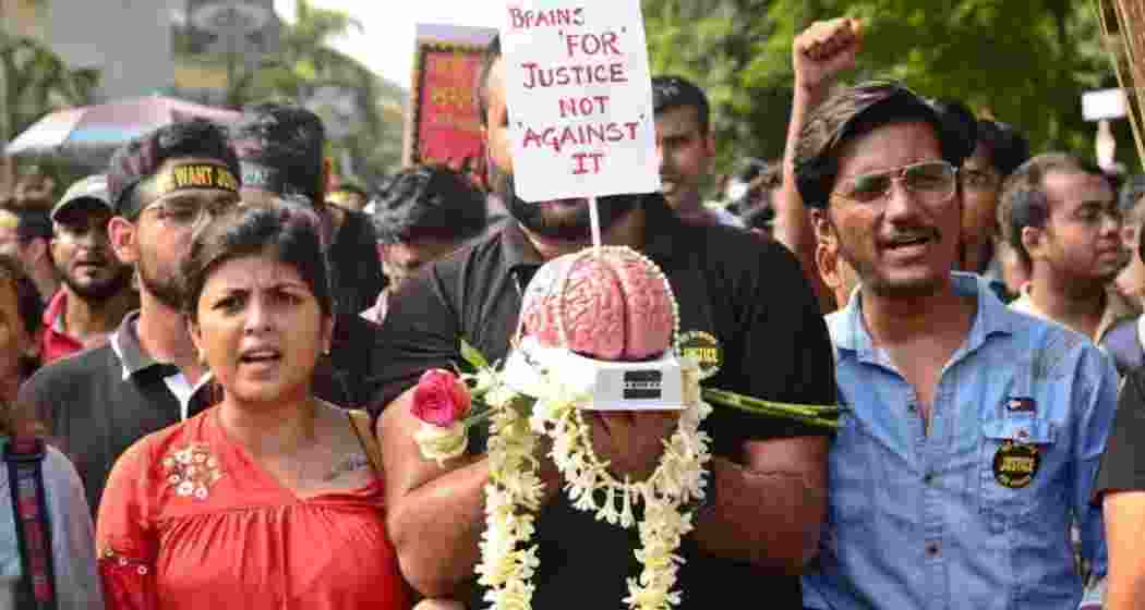 Junior doctors continue their protest at Swasthya Bhavan, Kolkata, demanding justice for RG Kar rape-murder victim.