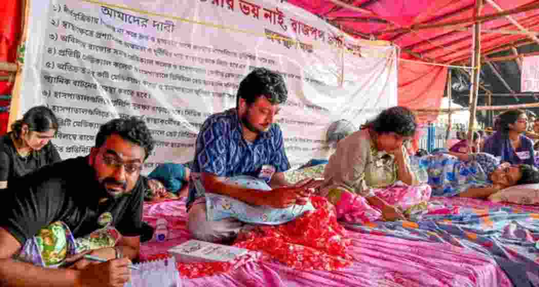 Junior doctors continue their hunger strike at Esplanade, Kolkata, demanding justice for a deceased colleague and improved workplace safety, as the protest enters its 13th day.