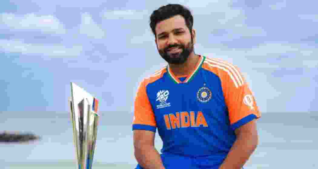 Indian captain Rohit Sharma poses with the 2024 ICC Men's T20 World Cup trophy.