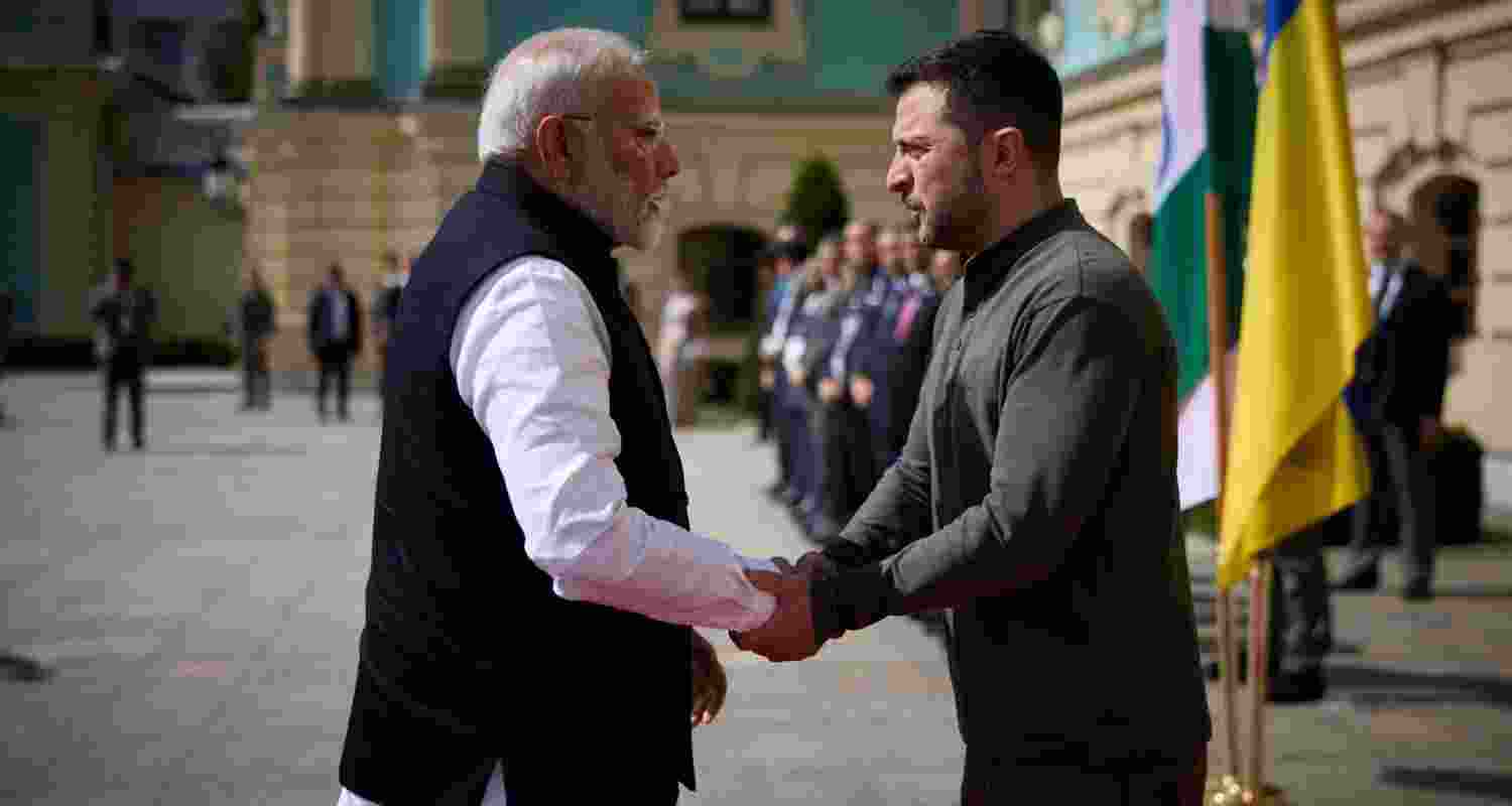 Ukrainian President Zelenskyy greets Indian PM Modi in Kyiv.