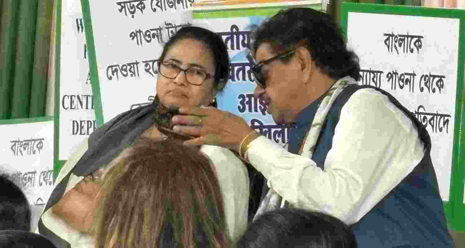 TMC MP Shatrughan Sinha with party supremo Mamata Banerjee.