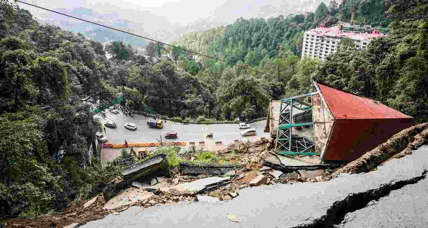 Damaged road after massive landslide at Baluganj due to Monsoon rainfall, in Shimla, Wednesday, Aug. 21, 2024. 