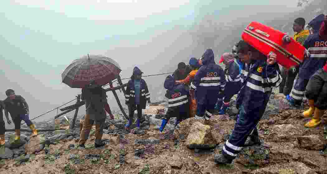 BRO personnel rescue stranded tourists after landslides, in North Sikkim.
