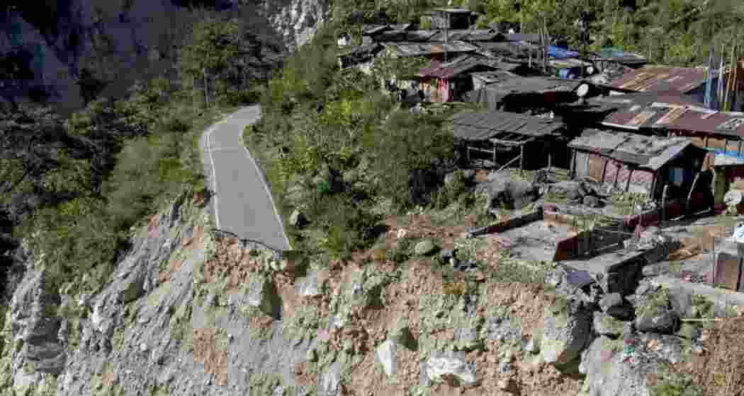 An aerial view reveals the extensive devastation in a village in North Sikkim following the Glacial Lake Outburst Flood, showcasing the destruction of roads, infrastructure, and the subsequent challenges faced by the affected.