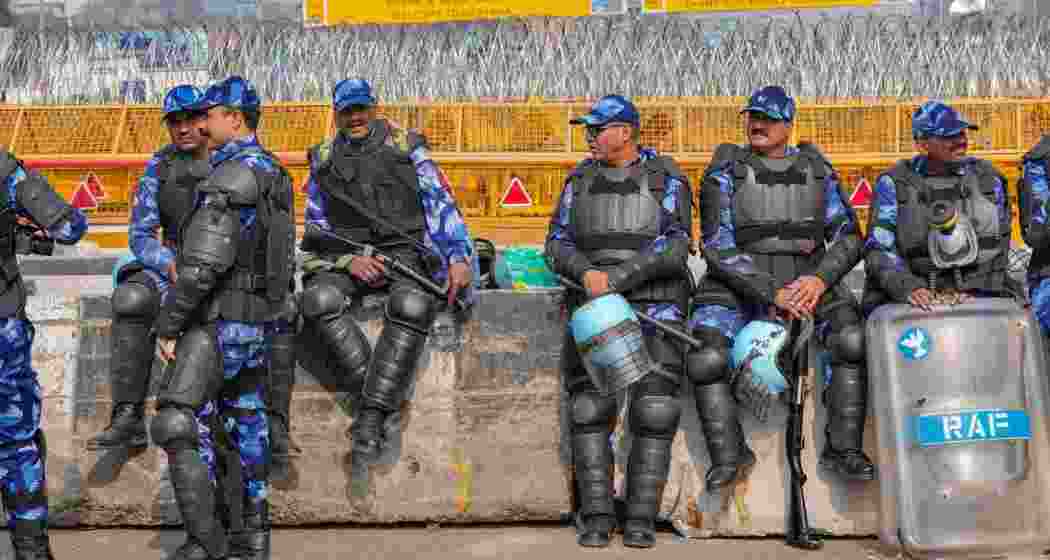 Rapid Action Force (RAF) personnel deployed at Singhu border in view of farmers' 'Delhi Chalo' march, in New Delhi on Tuesday.