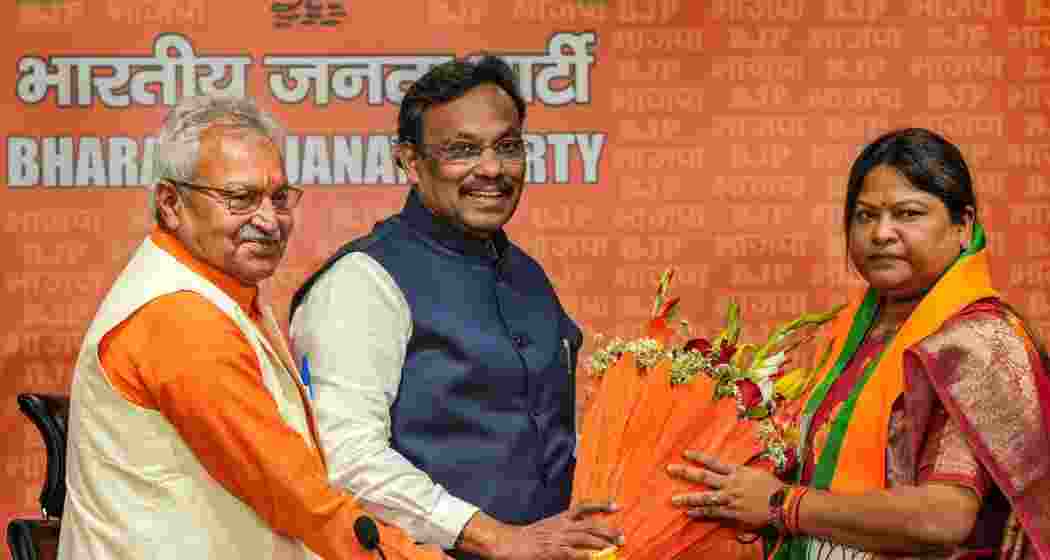 JMM legislator Sita Soren, the sister-in-law of former Jharkhand chief minister Hemant Soren, being felicitated by BJP leaders Vinod Tawde and Laxmikant Bajpai as she joins the party, in New Delhi on Tuesday, March 19, 2024