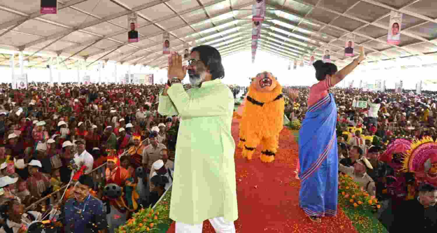 Hemant Soren greeting the audience during a public rally.