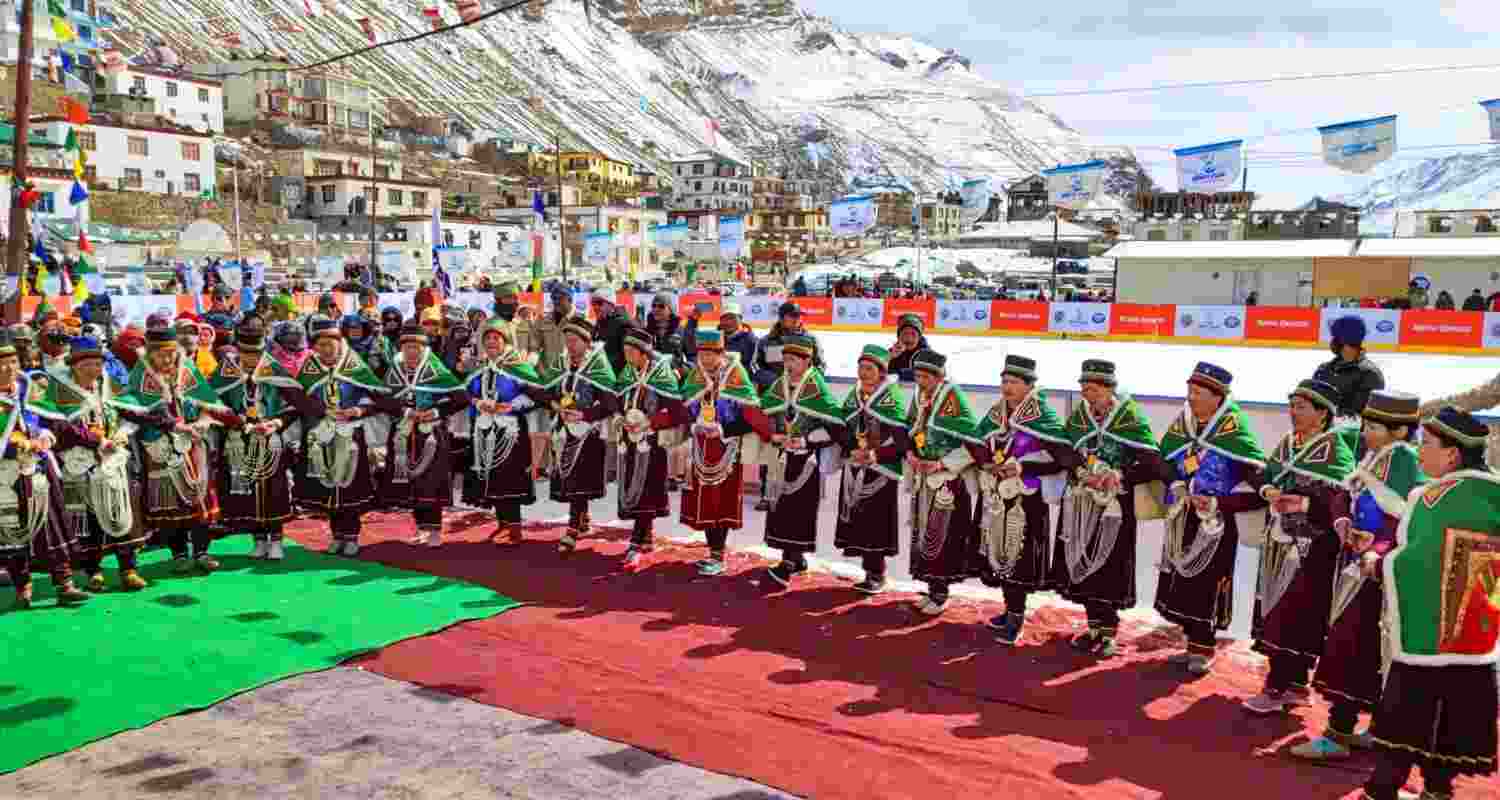 Lahaul and Spiti: Local artists perform the traditional dance 'Nati' during the inauguration of Ice Hockey Cup 2024 and Ice Speed Skates at an ice hockey rink at Kaza, in Lahaul and Spiti district, Himachal Pradesh. In the background are the snow-capped mighty Himalayas, that surround the picturesque valley.