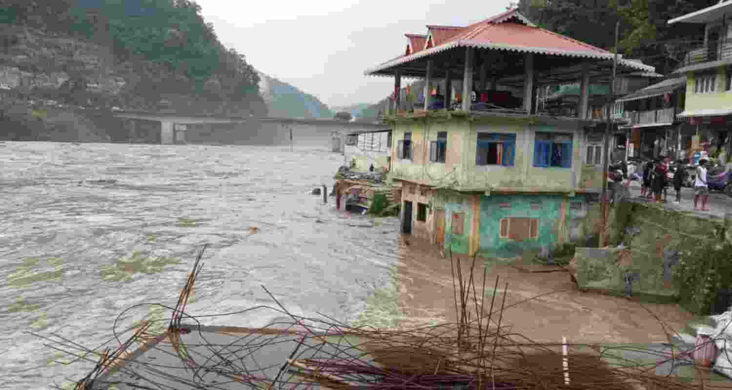 Partially submerged buildings due to overflowing of Teesta river following incessant rains, near Teesta Bazar area in Sikkim on June 20, 2024.