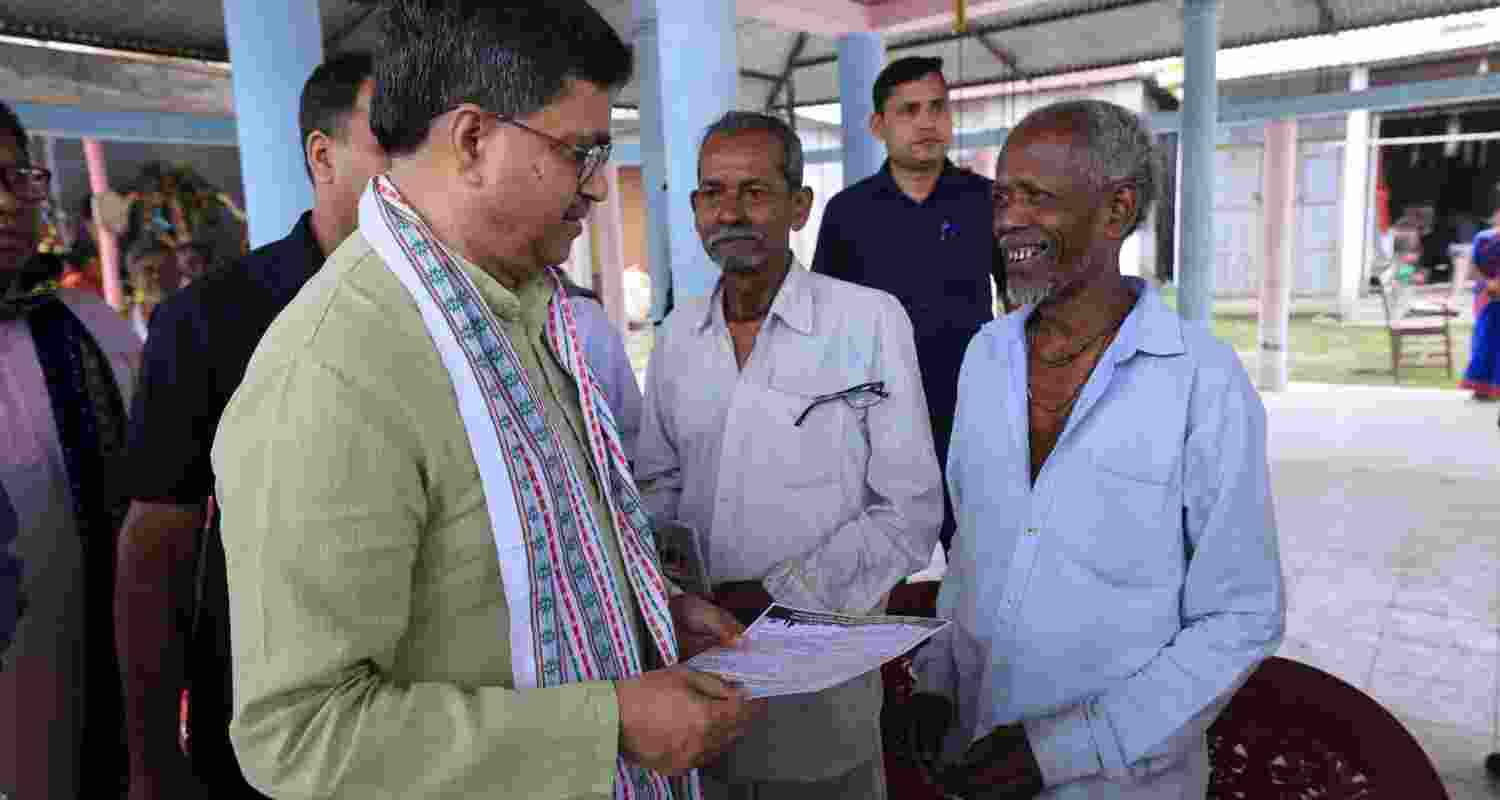 Tripura Chief Minister Manik Saha with locals at Kanchanmala area within the Tripura West Lok Sabha constituency on Thursday. 