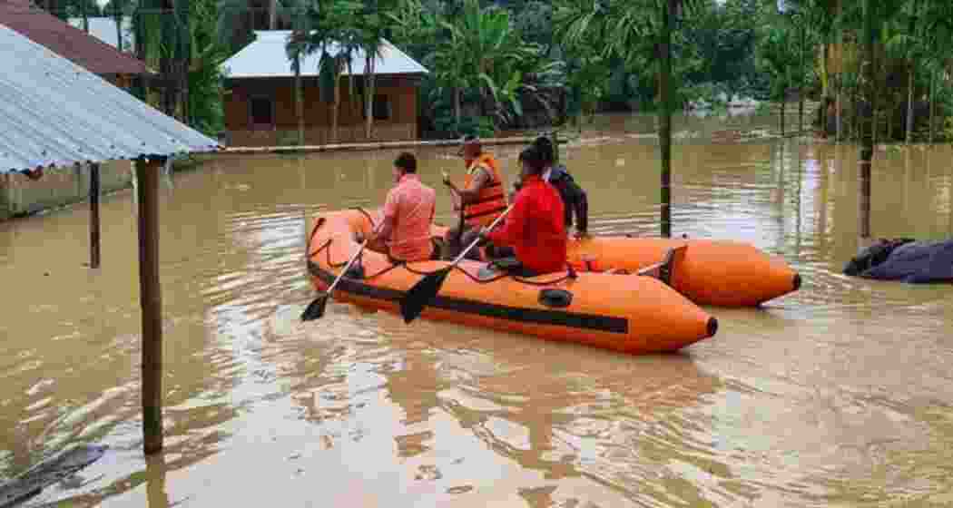 Rescue operations underway in flood-hit Tripura as heavy rains submerge villages and displace thousands.