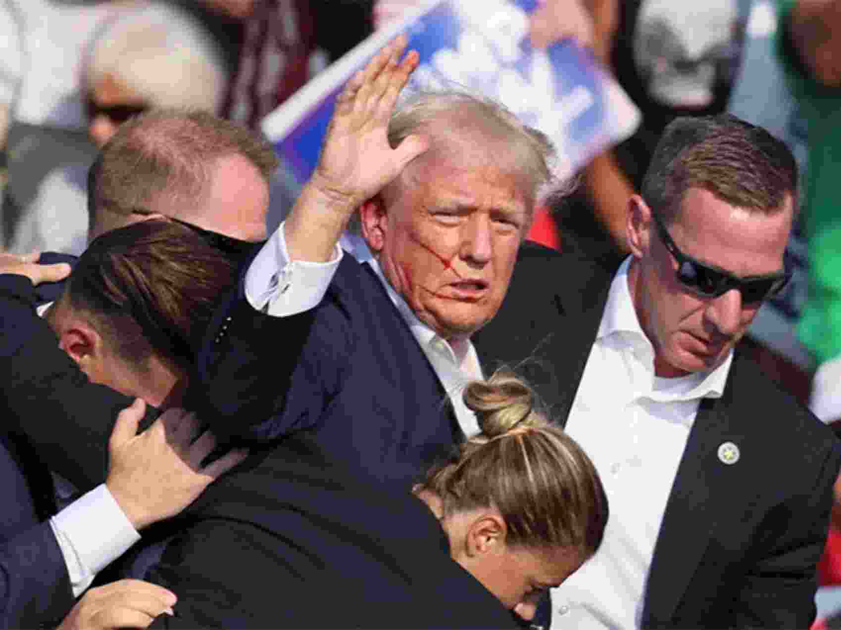 Former US president and Republican presidential candidate Donald Trump on Saturday said he was shot at during his rally in Pennsylvania and a bullet pierced the upper part of his right ear.