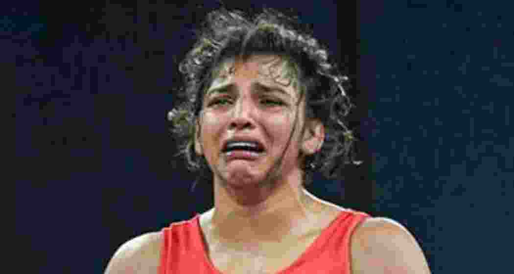 Sobbing Nisha Dahiya after losing her quarter-finals to North Korea's Pak Sol Gum.