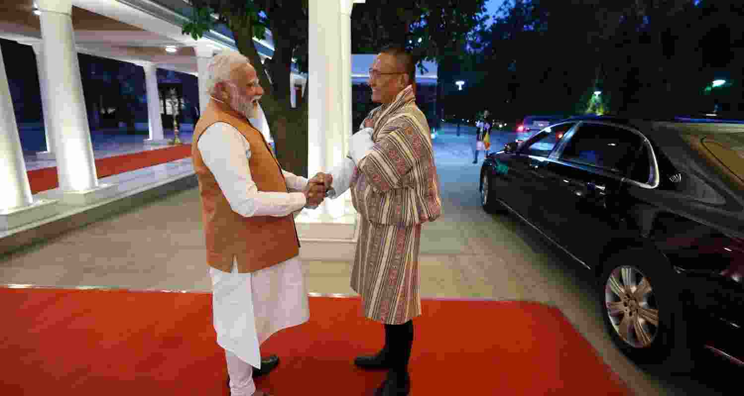 Indian Prime Minister Narendra Modi with Bhutanese Prime Minister Dasho Tshering Tobgay. Image X.