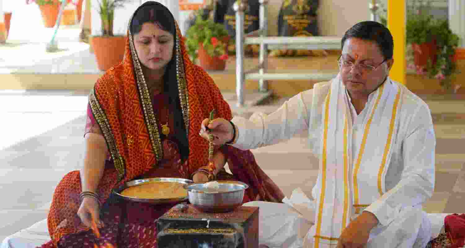 CM Dhami and his Wife offers Navratri Prayers. Image X.