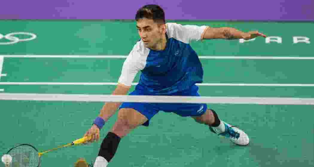 India's Lakshya Sen returns to Indonesia's Jonatan Christie during the men's singles group play stage badminton match at the 2024 Summer Olympics, in Paris, France, Wednesday, July 31, 2024.