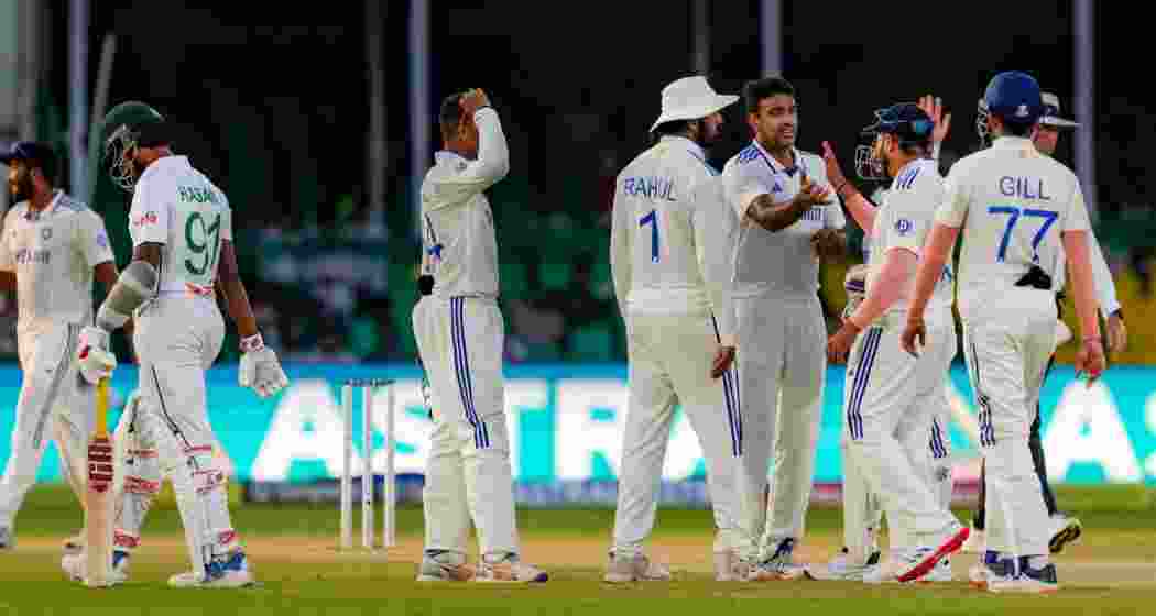 India's Ravichandran Ashwin with teammates celebrates the wicket of Hasan Mahmud during the fourth day of the 2nd Test cricket match between India and Bangladesh, at the Green Park stadium, Kanpur, Monday, Sept. 30, 2024. 