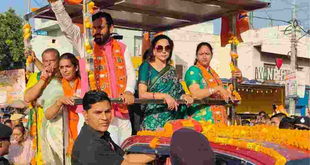 CM Saini, Hema Malini, and his wife hold a roadshow in Ladwa, Haryana. File Photo. 