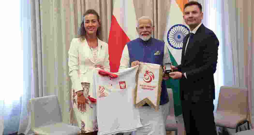 Prime Minister Narendra Modi during a meeting with Kabaddi players Michal Spiczko and Anna Kalbarczyk, in Warsaw, Poland, Thursday, Aug. 22, 2024. 