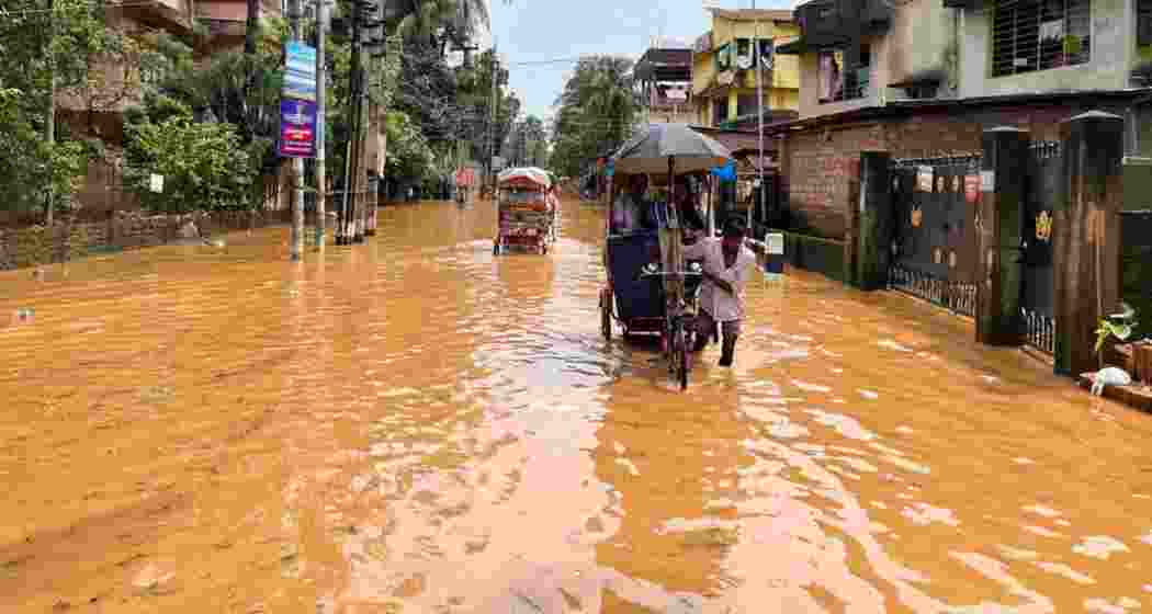 A waterlogged street in Guwahati as heavy rains disrupt normal life across the city.