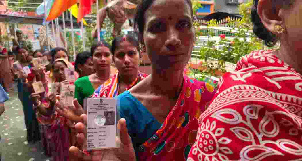Early morning queue of women voters outside of the polling station of Falta FP school under South 24 Parganas district in West Bengal.