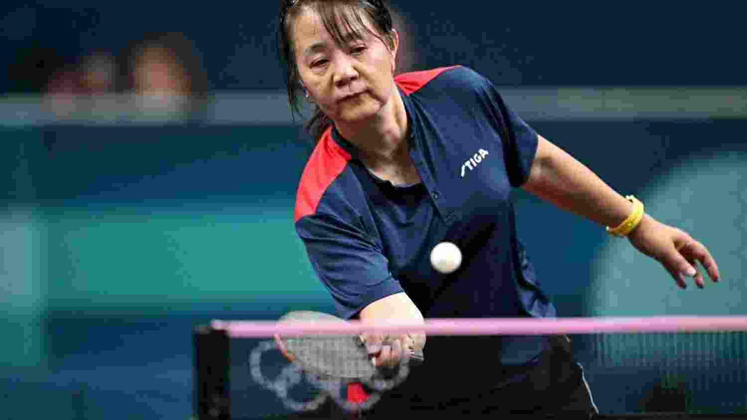 At 58, Zhiying Zeng makes stunning Olympics debut despite loss