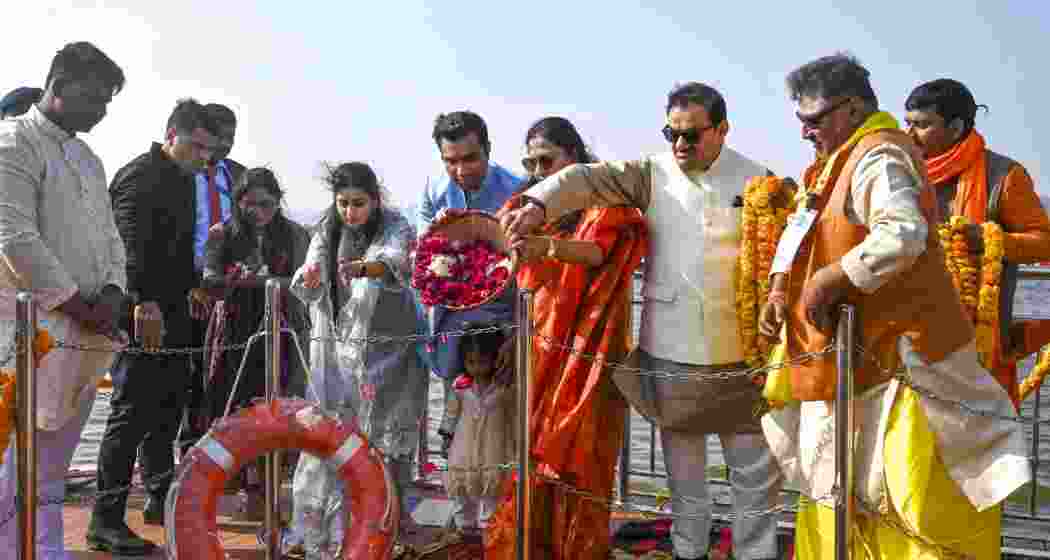 Adani Group Chairman Gautam Adani with his family performs 'puja' at Sangam during the Maha Kumbh Mela 2025, in Prayagraj, Uttar Pradesh on Tuesday, Jan. 21, 2025. 