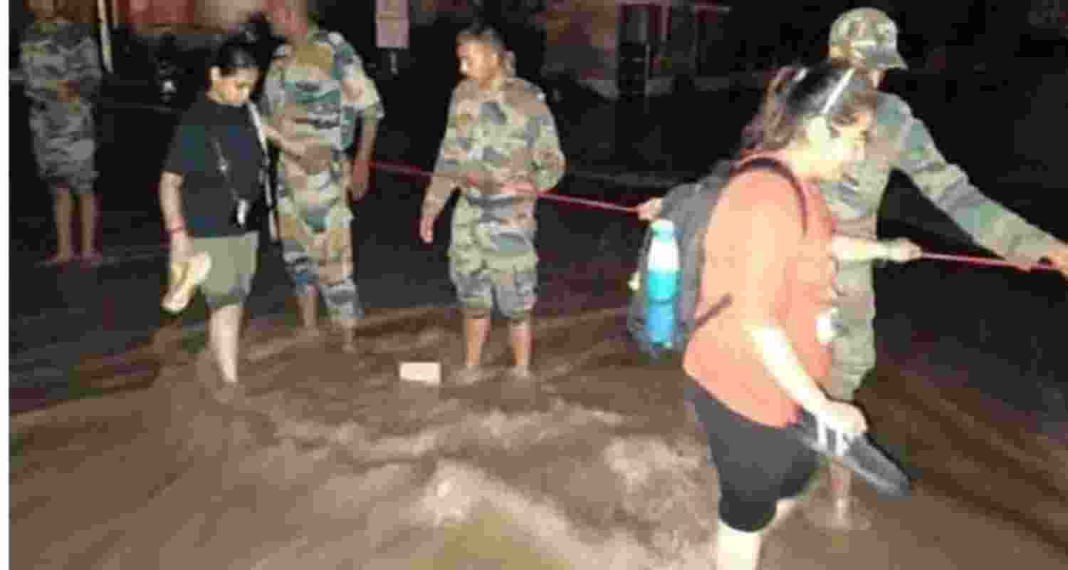Hostellers of a private university near Rajpura being evacuated by a rescue team.