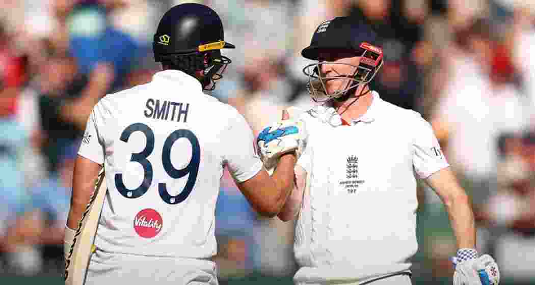 England batters celebrate after a boundary during the fourth Ashes Test at the Melbourne Cricket Ground, as the visitors sealed a morale-boosting four-wicket victory over Australia.
