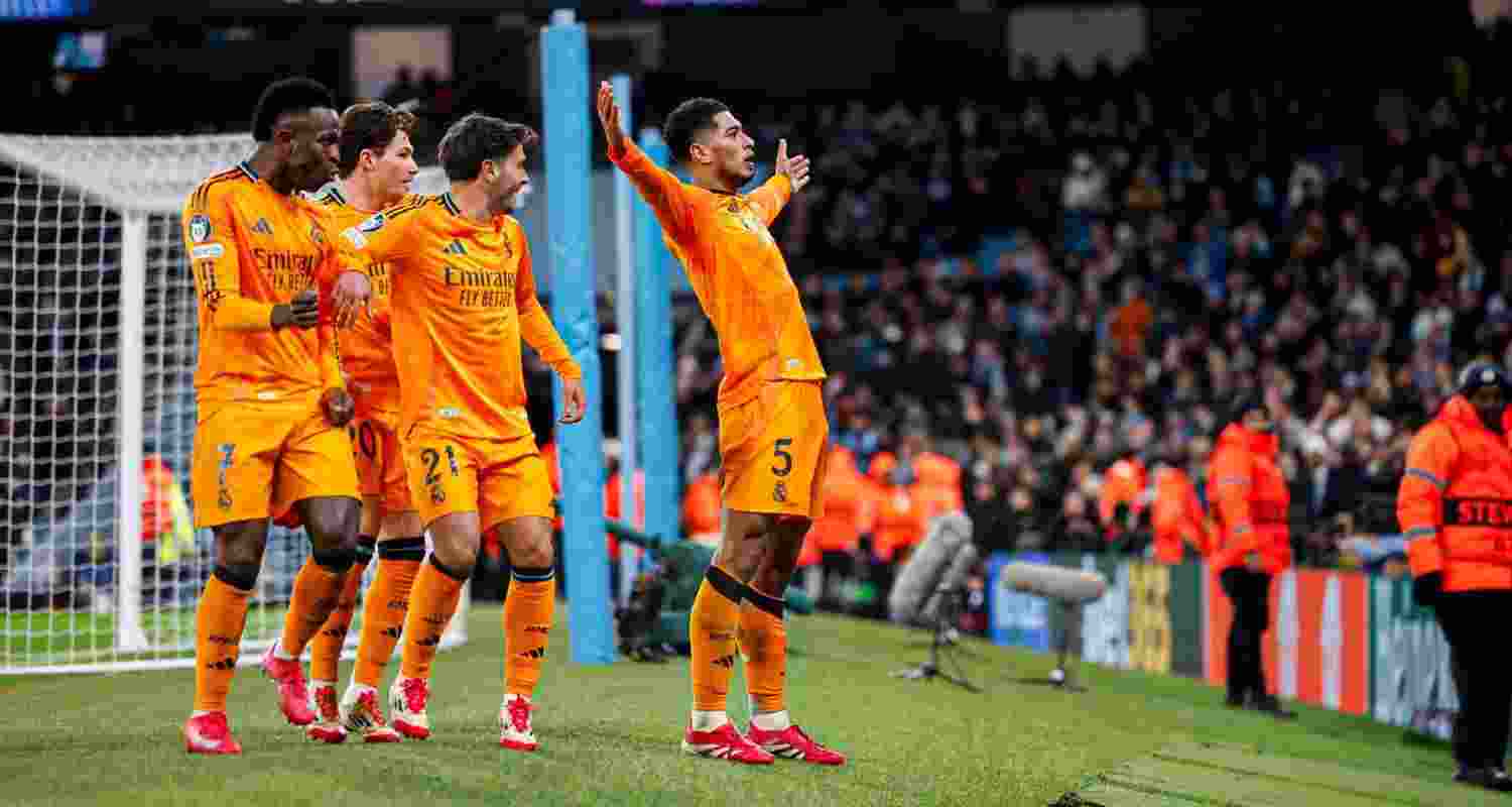 Jude Bellingham (right) celebrates with teammates after stoppage time. Image via X.