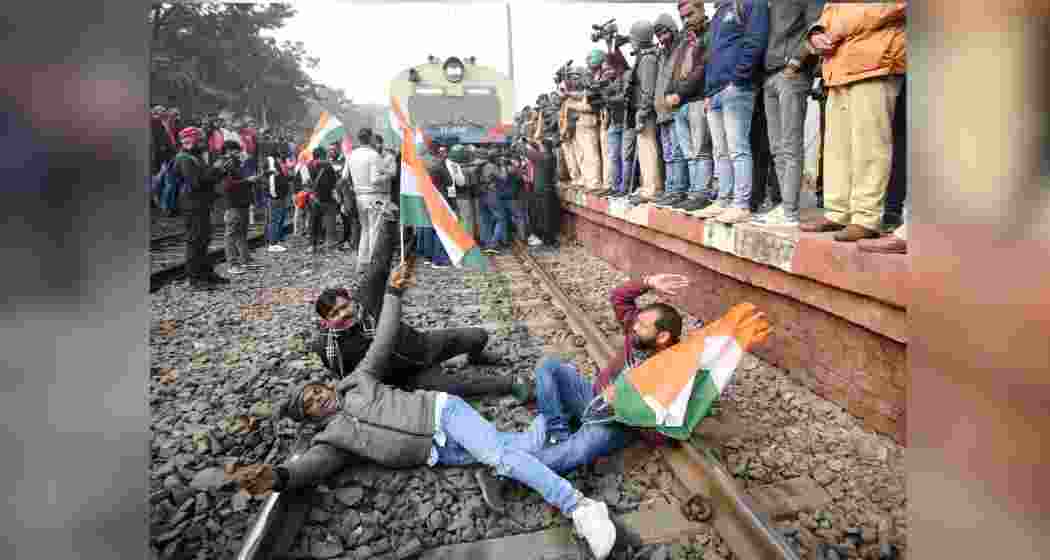 Students block railway tracks as they protest demanding the cancellation of the 70th Integrated Combined Competitive (Preliminary) Examination (CCE), 2024, conducted by the BPSC, over allegations of question paper leak, at Sachiwalay Halt railway station, in Patna on Friday, Jan. 3, 2025.