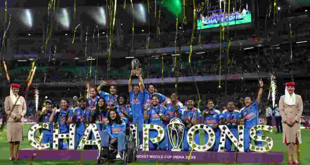 The Indian team celebrating their World Cup triumph at the DY Patil Stadium in Navi Mumbai on Sunday night.
