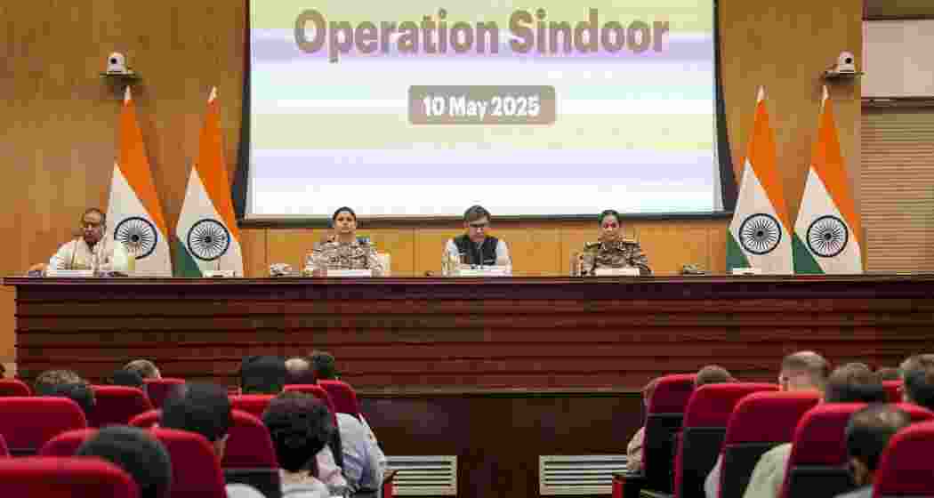 Foreign Secretary Vikram Misri with IAF officer Wing Commander Vyomika Singh and Army's Colonel Sofiya Qureshi during a press conference, in New Delhi, Saturday, May 10, 2025.