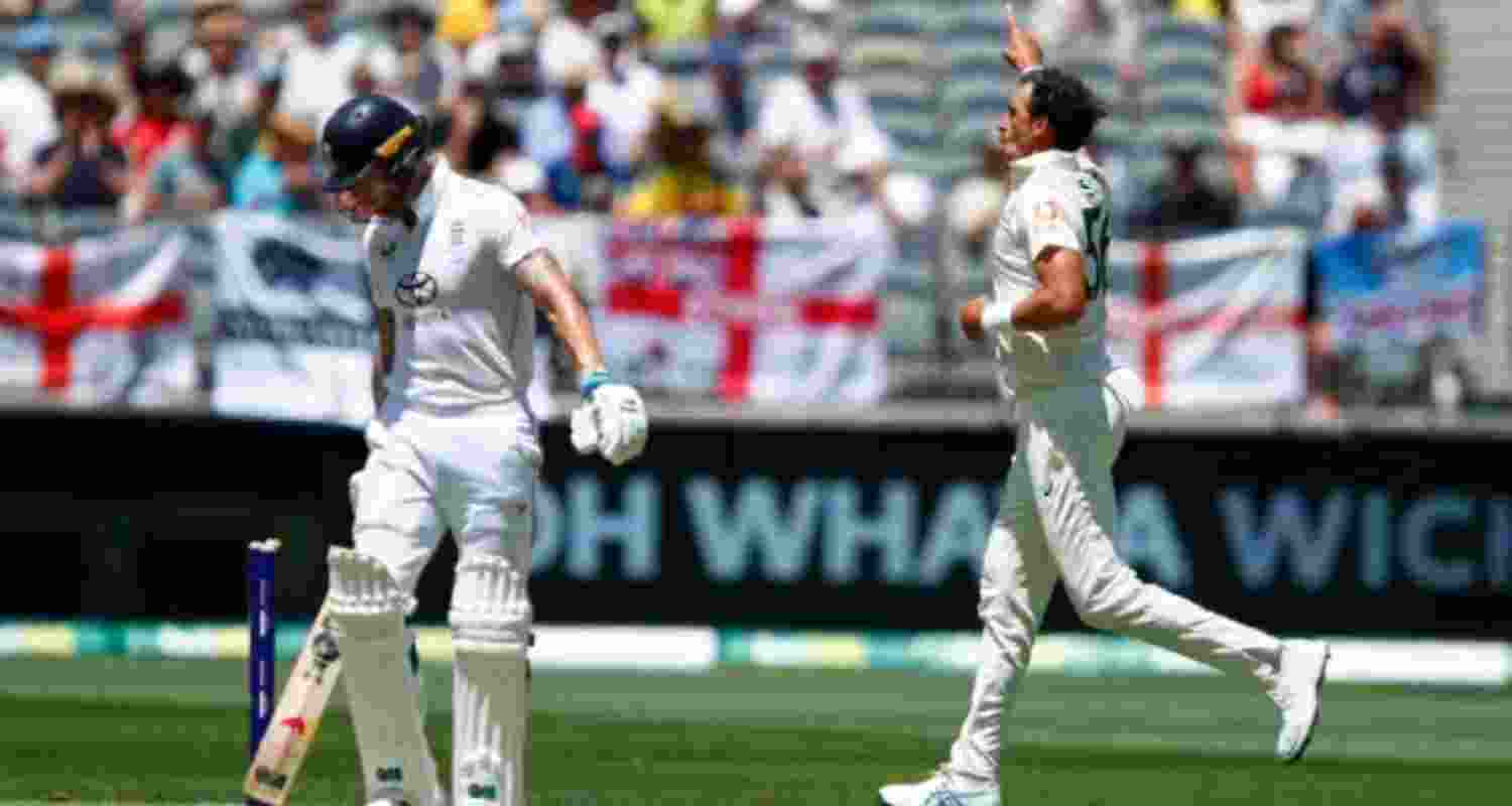 Australia's Mitchell Starc celebrates after bowling England's captain Ben Stokes (left) out during the first Ashes Test match between Australia and England in Perth on Friday.
