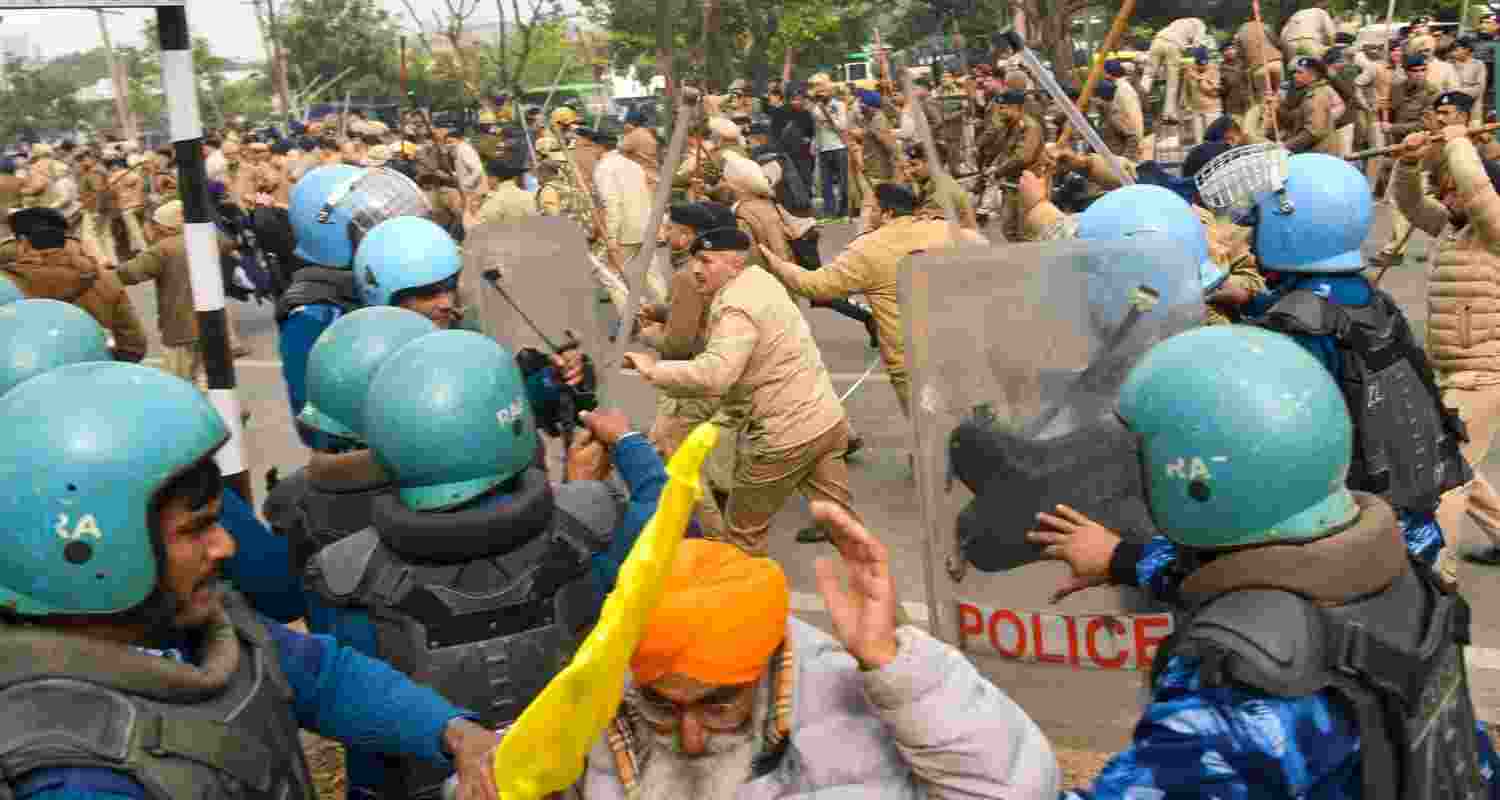 Clash between Quami Insaaf Morcha members and security personnel as the latter try to prevent the protesters from marching towards Punjab Chief Minister Bhagwant Mann on Tuesday.