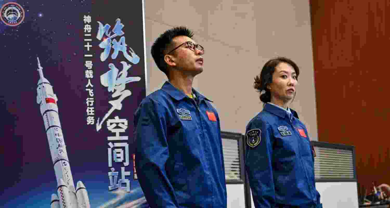 Staff members attending a press conference of the Shenzhou-21 Manned Space Mission a day before the mission's launch at the Jiuquan Satellite Launch Centre in Jiuquan on Thursday.